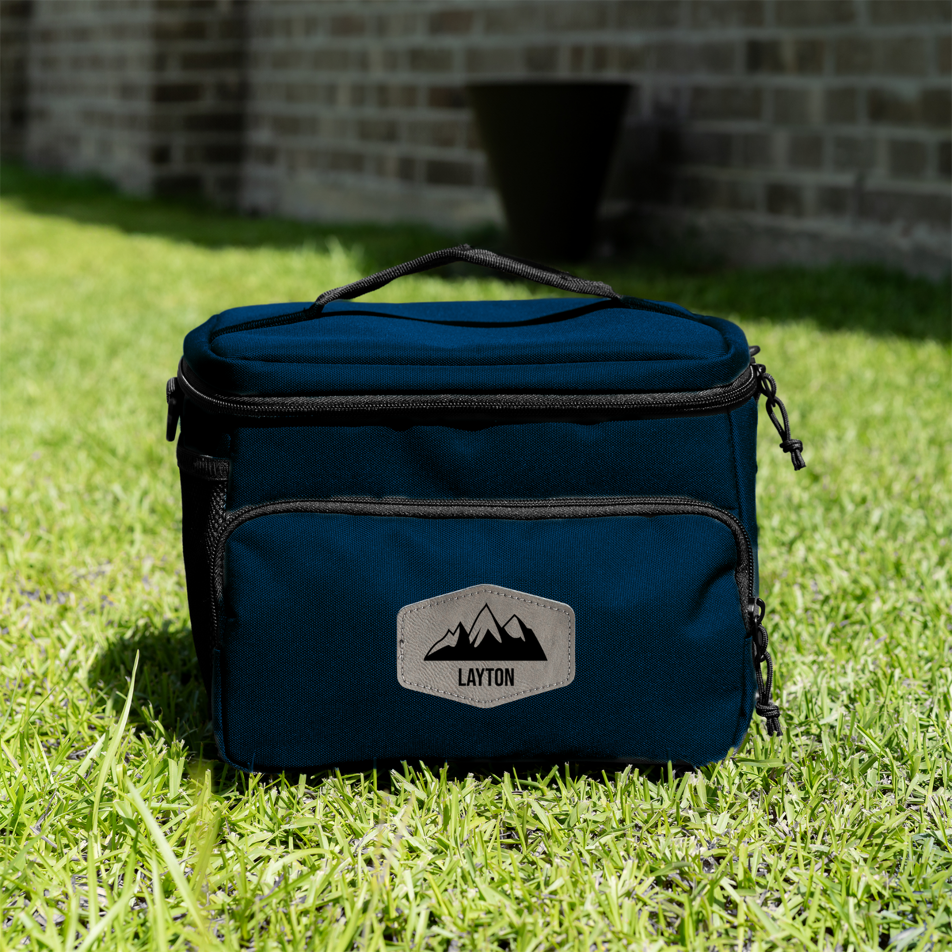 Blue cooler bag with Custom text on grass